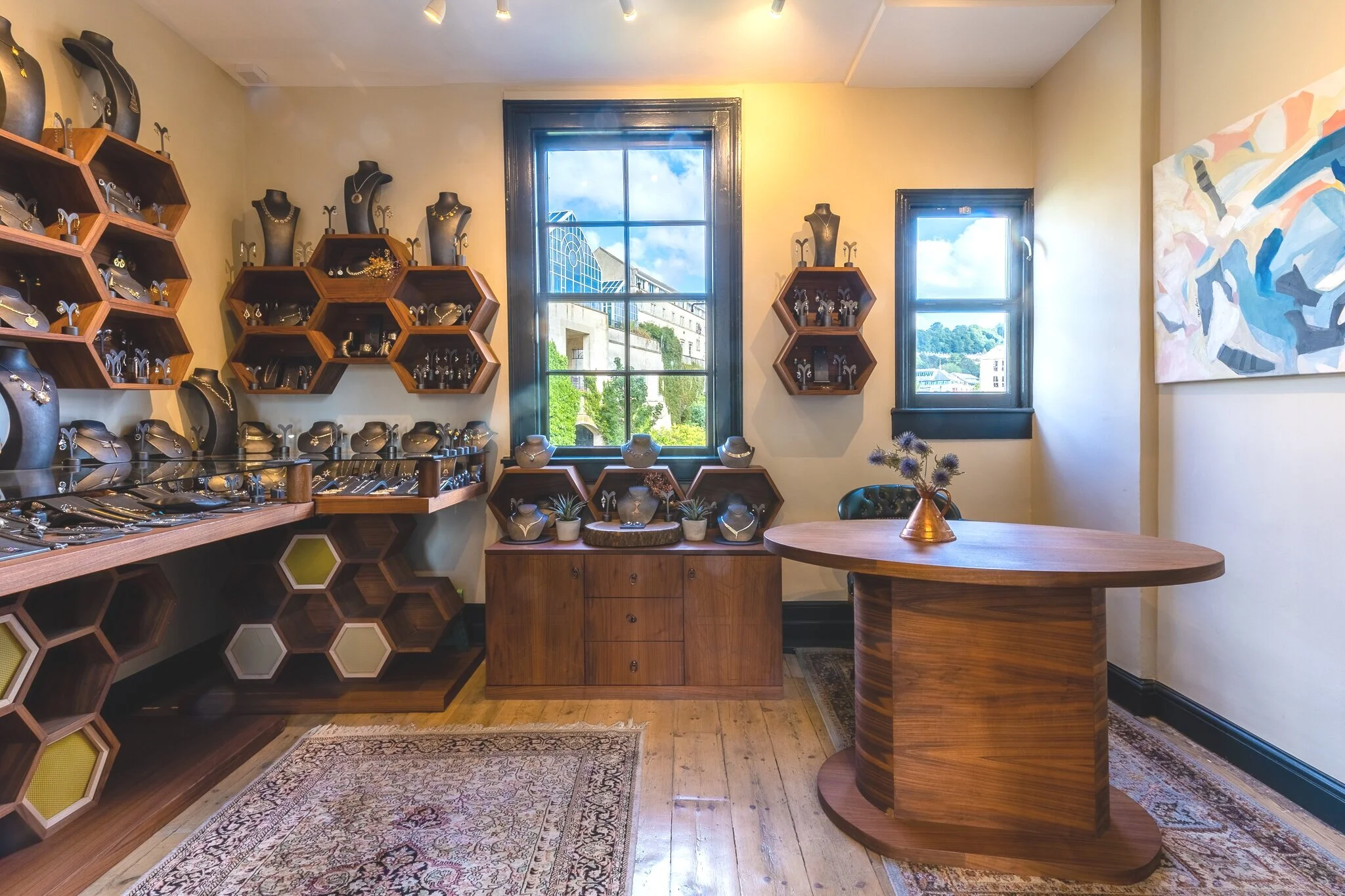 Interior of Icarus Jewellery, handmade silver pieces in the bridge windows